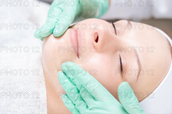 Portrait of a woman's face with problem skin. Peeling procedure. Natural beauty.