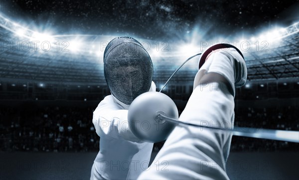 Portrait of two fencers against the backdrop of a sports arena. The concept of fencing. Duel.