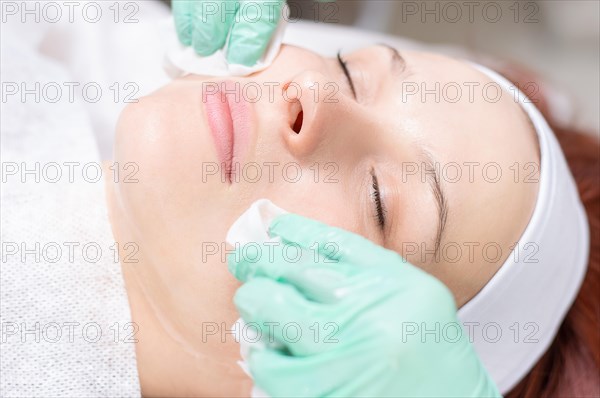 Portrait of a woman's face with problem skin. Peeling procedure. Natural beauty.