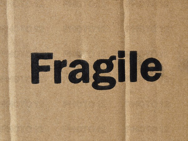 Corrugated cardboard with fragile label