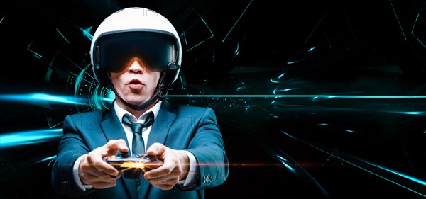 Portrait of a man in a suit and helmet of a pilot with a joystick in his hands. He enthusiastically plays a computer game. Game space. Game concept.