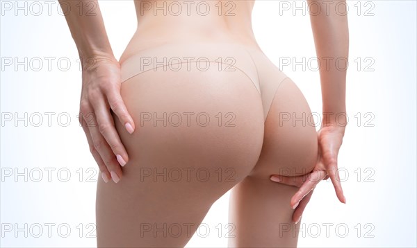 Image of female buttocks. Body care. Diet. Proper nutrition. Calorie counting. Healthy lifestyle. Anti-cellulite.
