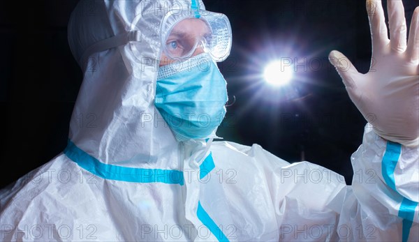 Doctor laboratory assistant in personal protective equipment against coronavirus