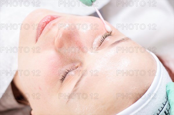 Portrait of a woman's face with problem skin. Peeling procedure. Natural beauty.