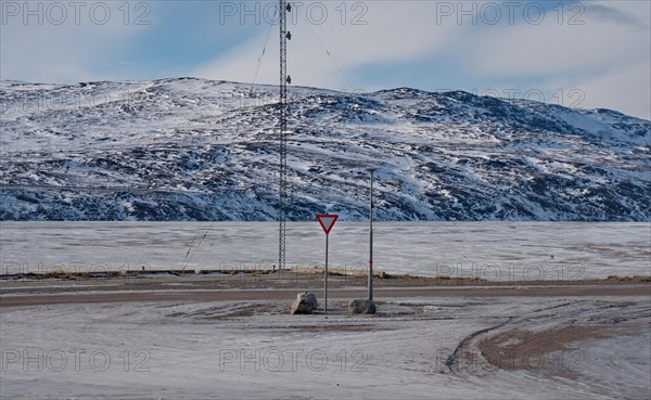 Traffic sign Give way on the main road in Kangerlussuaq