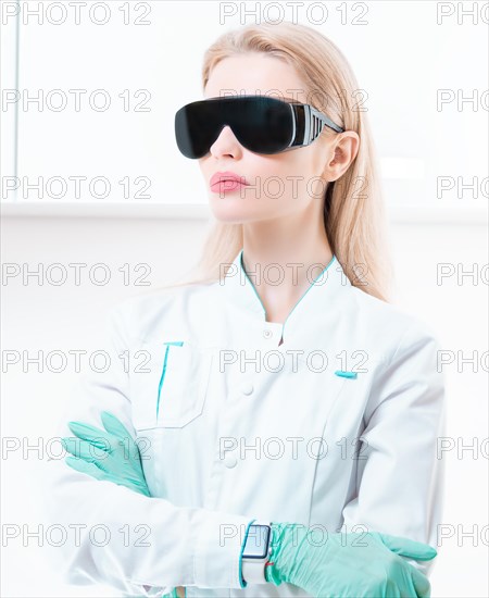 Portrait of a girl in black glasses for laser hair removal. Concept of cosmetology