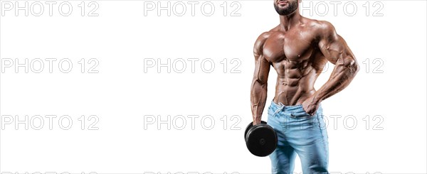 No name sexy muscular man in jeans posing on white background with dumbbell. Bodybuilding and fitness concept.