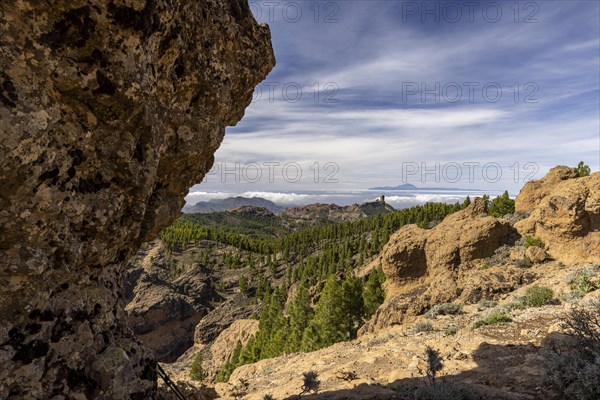 View of Roque Nublo and the Teide mountain peak on the neighbouring island of Tenerife