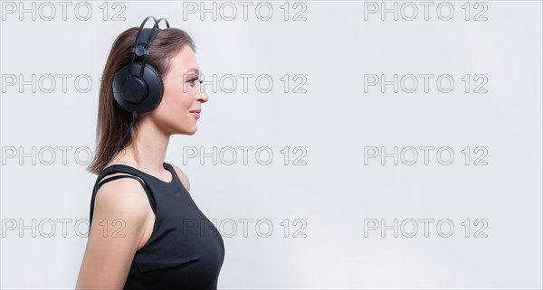 Image of an attractive woman with a headset. TV shopping concept.