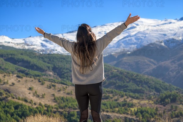 Latina woman opening her arms