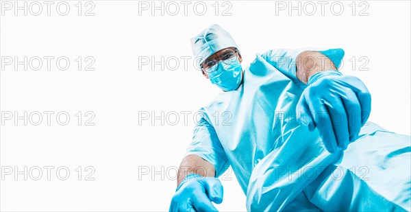 Portrait of a doctor in a mask on a white background. Medicine concept.