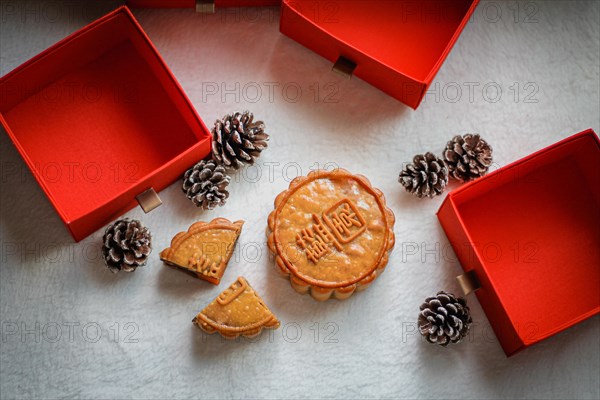 Chinese mooncakes and pinecones symbolizing the Mid-Autumn Festival