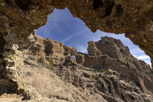 View through rock arch to another rock arch