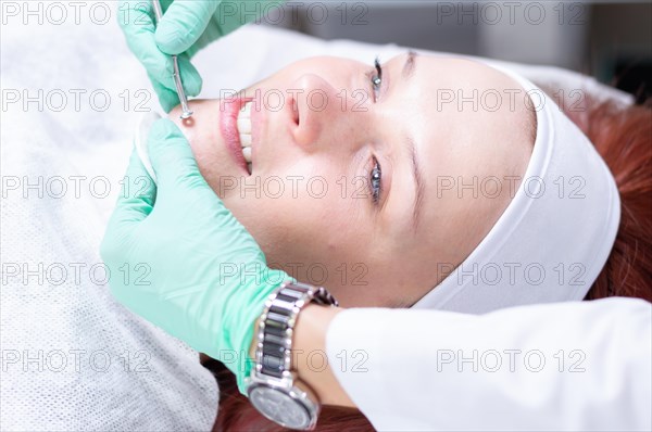 Portrait of a woman's face with problem skin. Peeling procedure. Natural beauty.