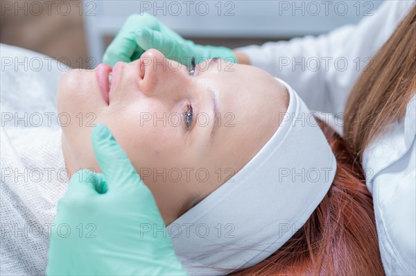 Portrait of a woman's face with problem skin. Peeling procedure. Natural beauty.