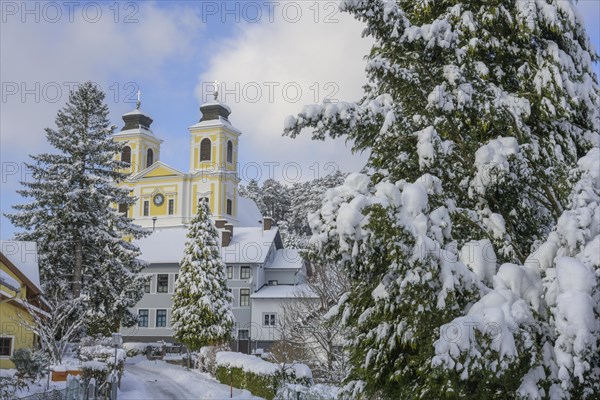 Church on the Hafnerberg in a wintry landscape