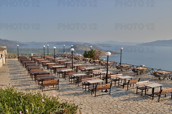 Restaurant terrace above Qeparo with views of the Ionian Sea and Corfu