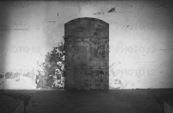 Saint Petersburg Russia 23.07.2021. Image of a metal door at Fort Constantine