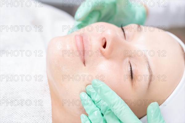 Portrait of a woman's face with problem skin. Peeling procedure. Natural beauty.