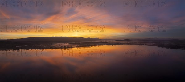 Aerial panorama of an atmospheric sunset over the Untersee