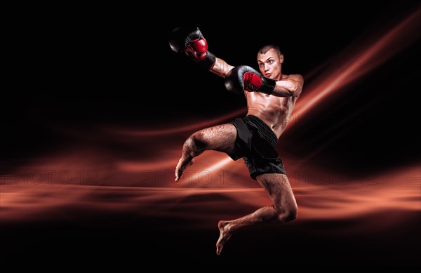 Flying mma fighter. Kickboxing concept. Knee strikes. High quality