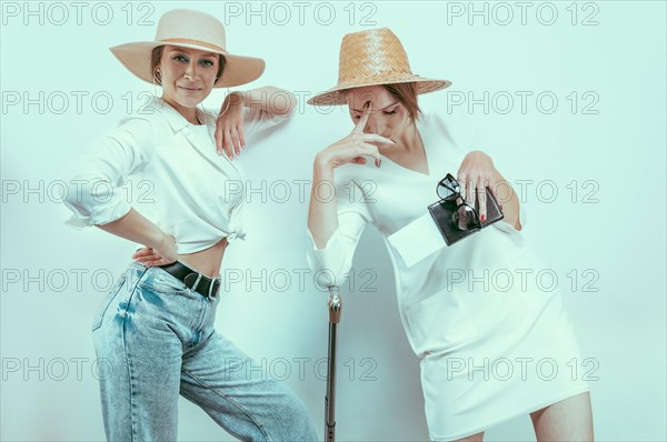 Portrait of two women with passports