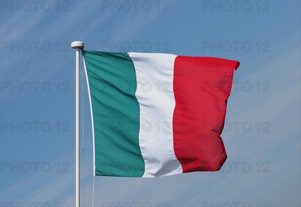 Italian Flag of Italy over blue sky