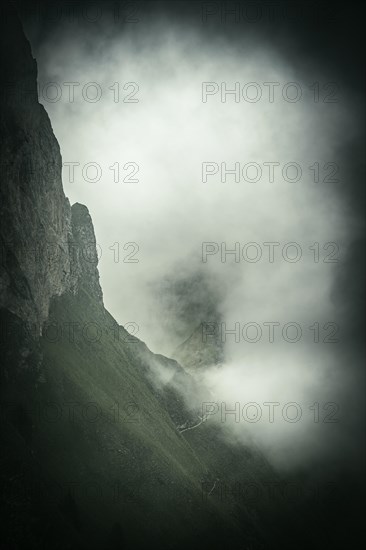 Summit ridge with dramatic clouds