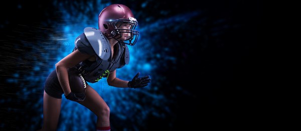 Image of a girl in the uniform of an American football team player. She runs with the ball against the background of light spots. Sports concept. Shoulders pads.