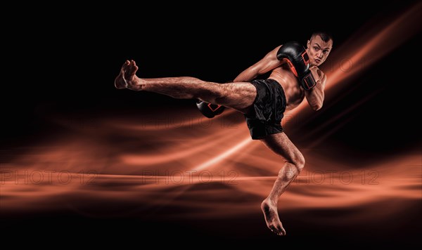 Flying mma fighter. Kickboxing concept. Knee strikes. High quality