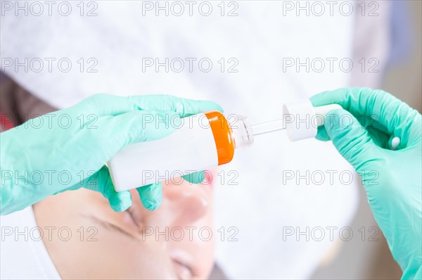 Image of bottles with medicines for facial skin care. Concept for beauty salons.