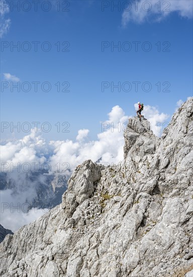 Mountaineer on rocky peak