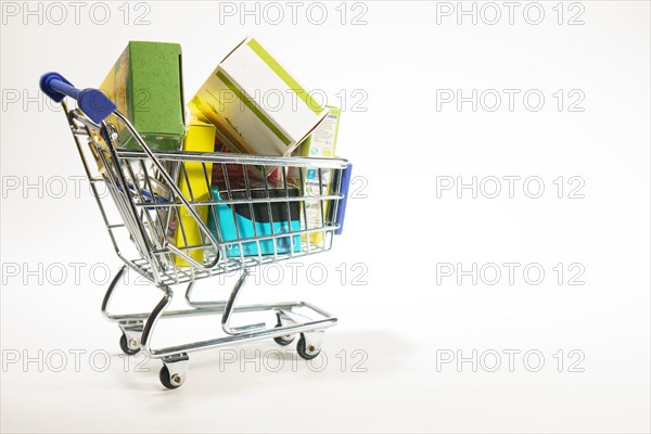 Shopping cart full of food purchased at the supermarket