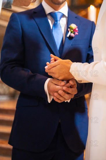 Bride and groom delivering earnest money at a church wedding