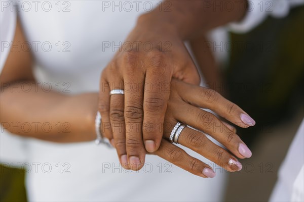 Hands of bride and groom with rings at a wedding