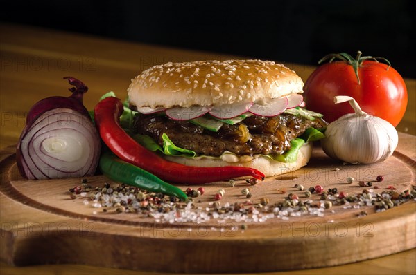 Delicious burger with fried beef chops