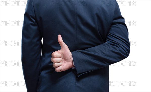 Image of a man's hands showing ok sign on a white background. Back view. Business concept.