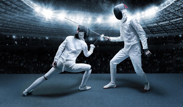 Portrait of two fencers against the backdrop of a sports arena. The concept of fencing. Duel.