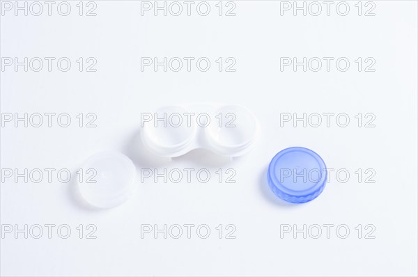 Boxes for lenses on a white background. Ophthalmology concept.