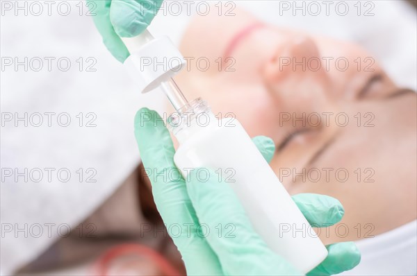 Image of bottles with medicines for facial skin care. Concept for beauty salons.