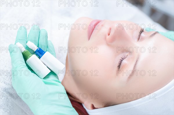 Image of bottles with medicines for facial skin care. Concept for beauty salons.