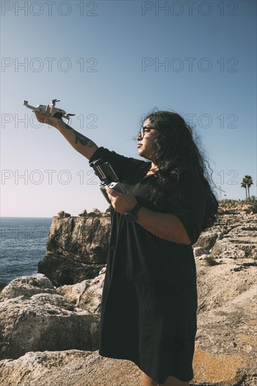 Happy woman with drone