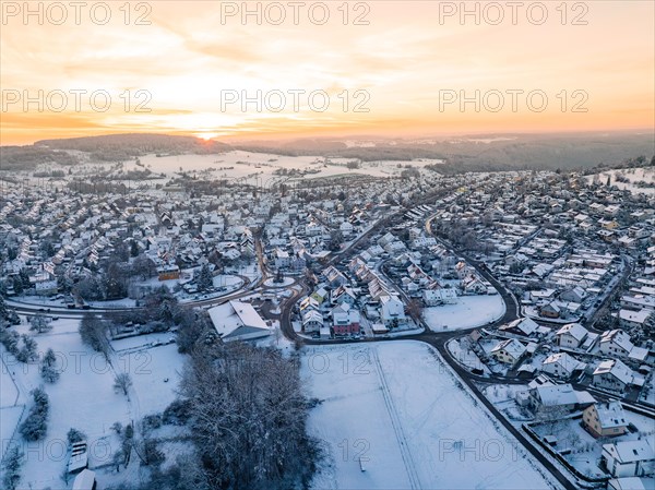 Winter town awakes at sunrise