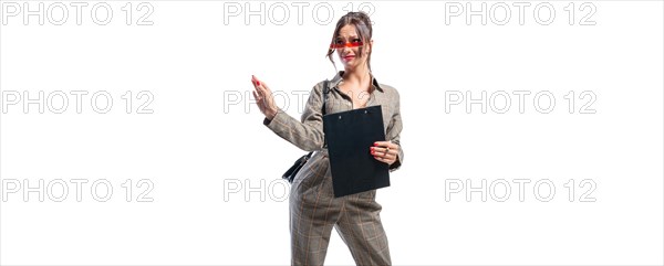 Beautiful girl with glasses shows the OK sign. Holiday sales concept.