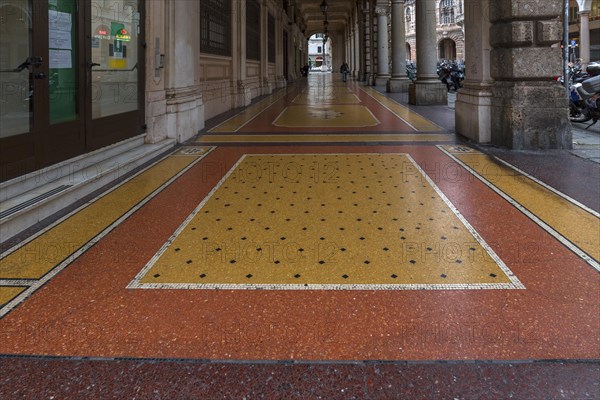 Floor mosaic in an arcade on Via XX Settembre