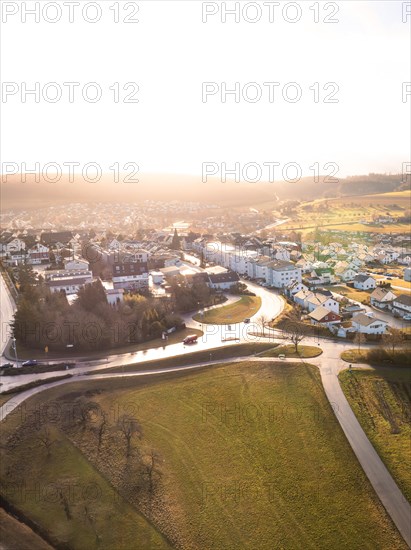 Sunset over a town with a warm