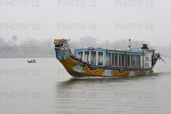 Boat on river in the fog