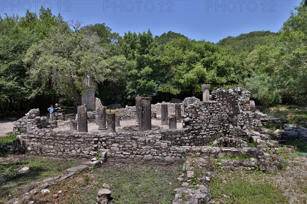 Remains of walls and columns of the baptistery in the ruined city of Butrint