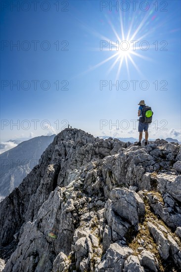 Mountaineer on rocky mountain path