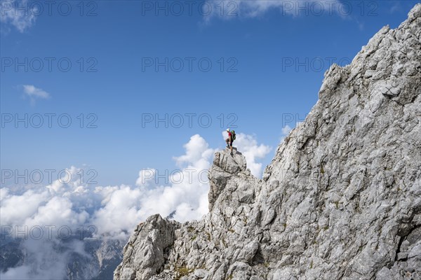 Mountaineer on rocky peak